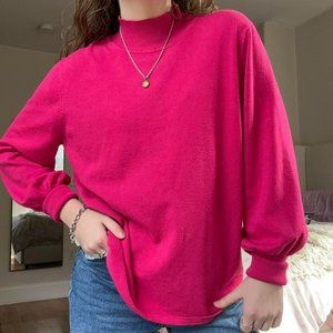 Bright pink mock neck sweater